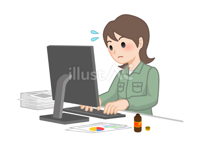 パソコンで大量の仕事をしている作業着の女性