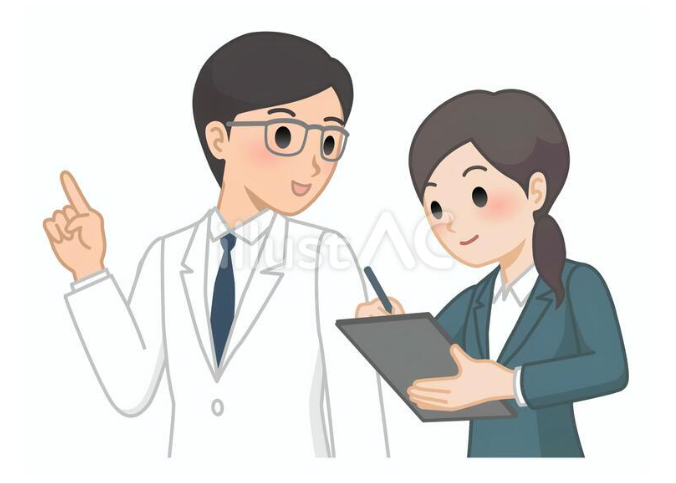 説明をする白衣男性とメモするスーツ女性
