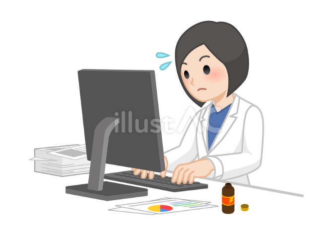 大量のデスクワークをする白衣を着た女性