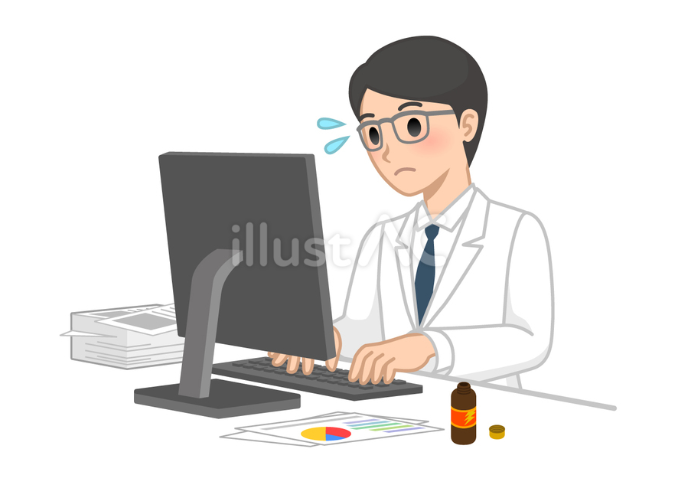 大量のデスクワークをする白衣を着た男性